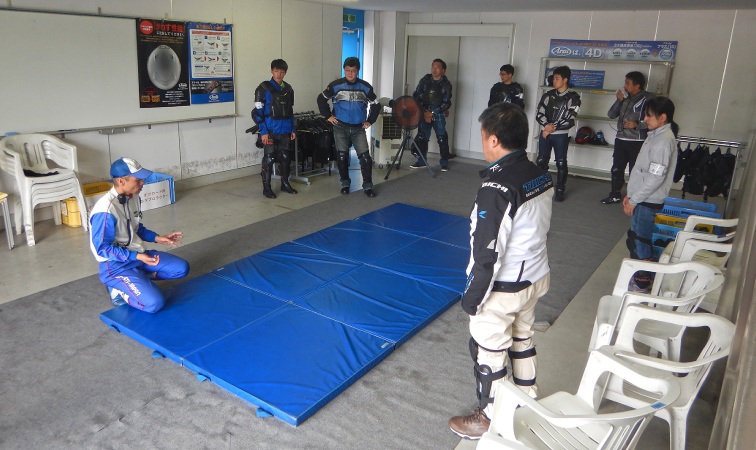 Vehicle preparation, exercises, putting on protectors, mat exercises